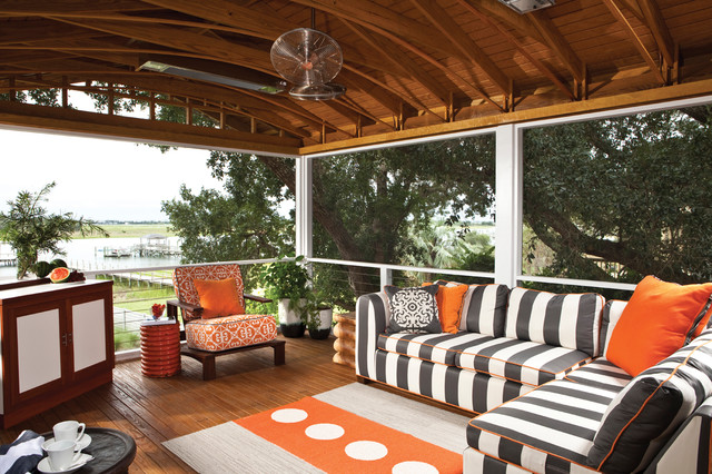 Screened Porch with Decorative Arched Rafters tropical-terrace