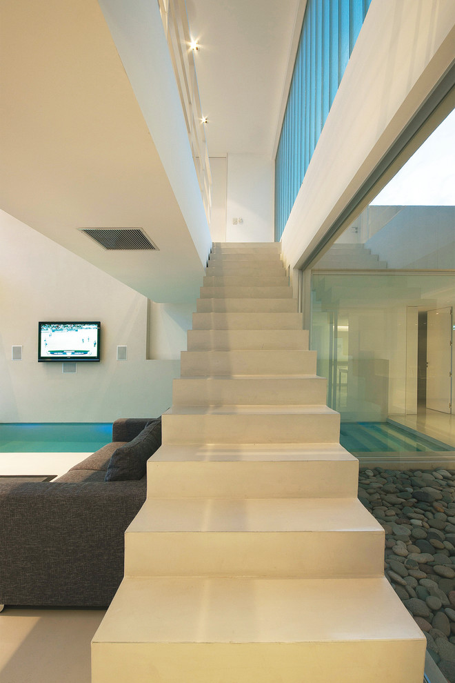 Photo of a contemporary straight staircase in Other.