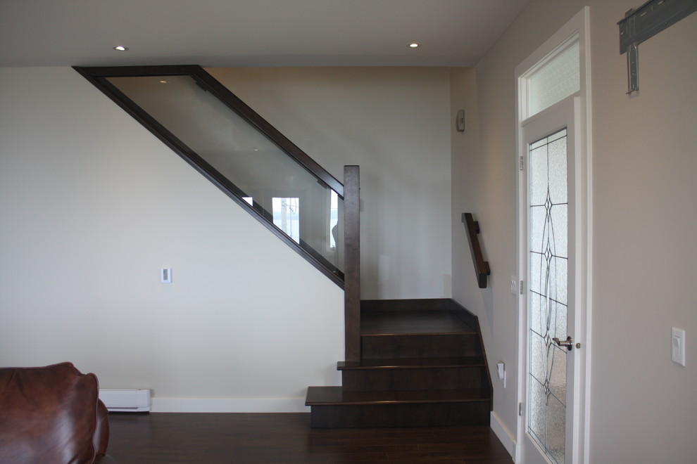 Inspiration for a mid-sized transitional staircase remodel