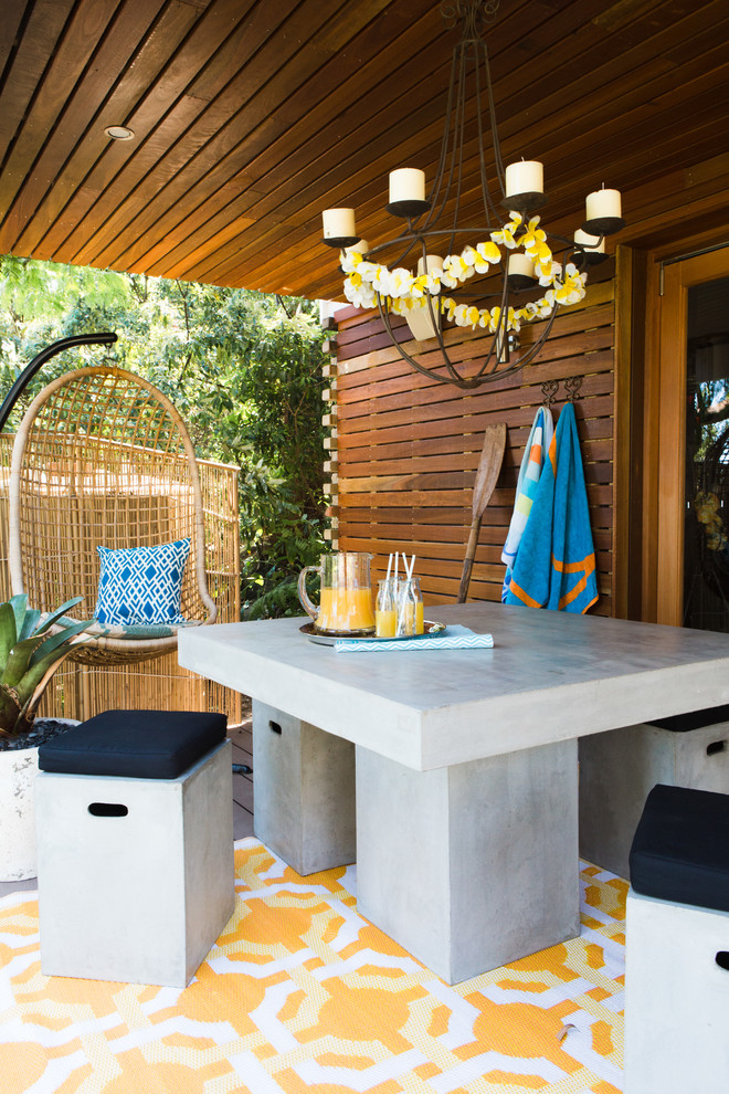 This is an example of a small beach style deck in Sydney.