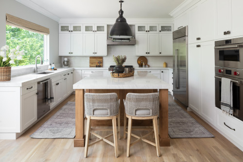 Bright white Kitchen Cabinet Mississauga design with large center island and woven bar stools