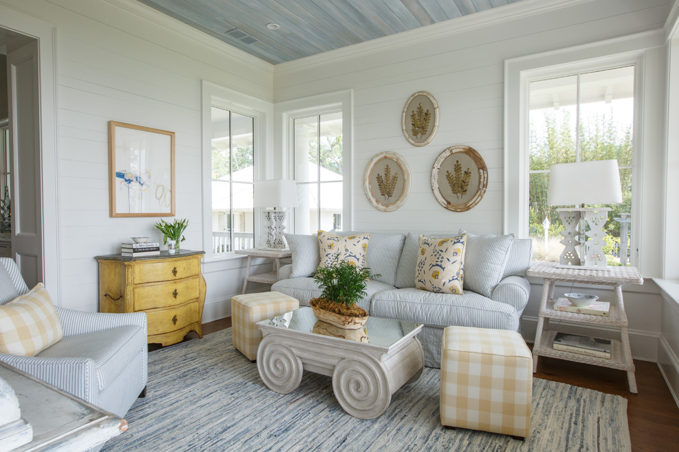 Inspiration for a timeless medium tone wood floor and brown floor sunroom remodel in Jacksonville with a standard ceiling