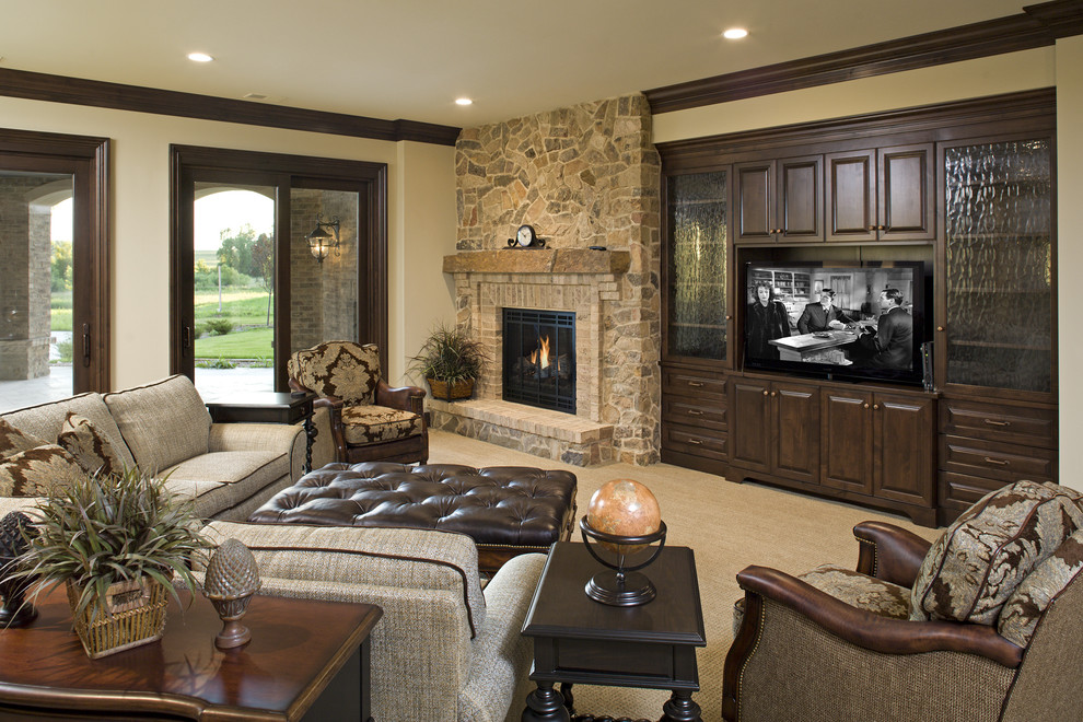 Design ideas for a traditional family room in Minneapolis with a stone fireplace surround.
