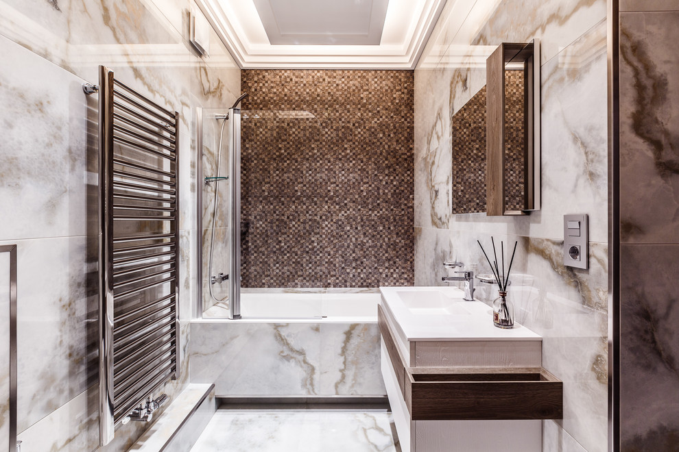 Inspiration for a contemporary master bathroom in Other with flat-panel cabinets, an alcove tub, a shower/bathtub combo, beige tile, brown tile, an integrated sink and a hinged shower door.