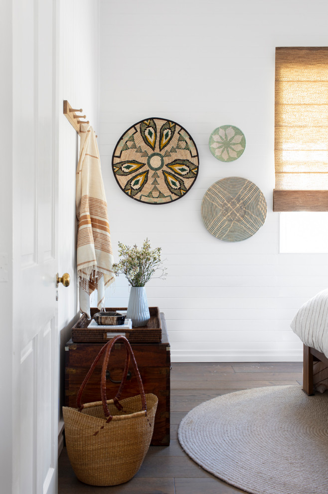 This is an example of a mid-sized beach style bedroom in Brisbane.