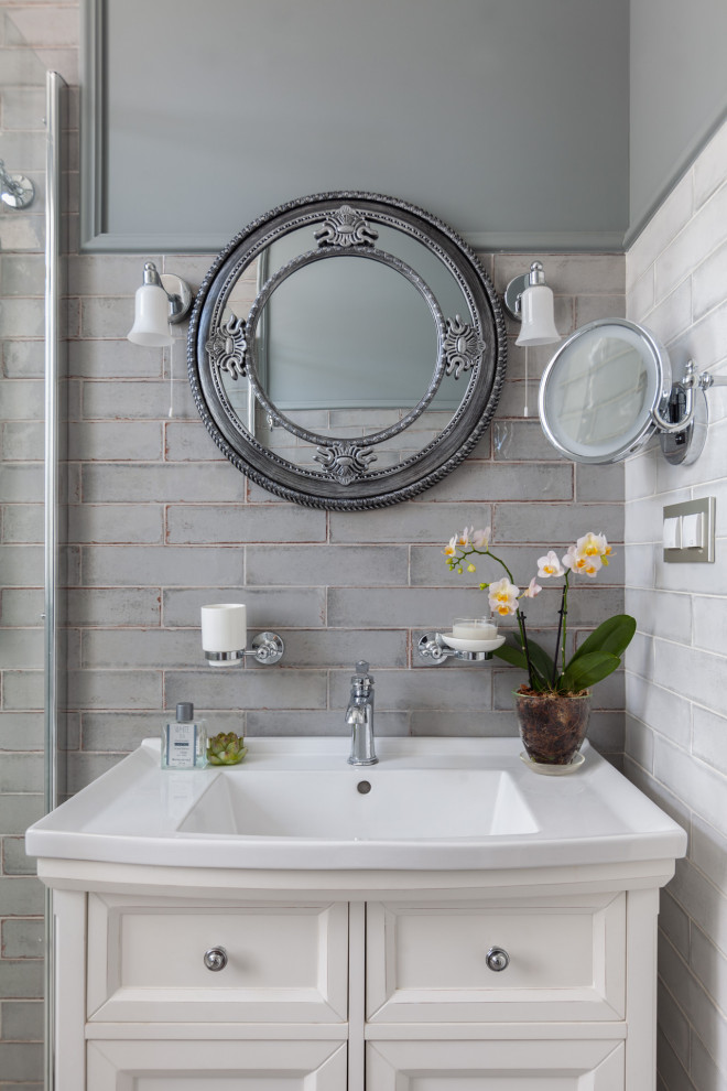 Inspiration for a small traditional 3/4 wet room bathroom in Moscow with white cabinets, gray tile, subway tile, grey walls, porcelain floors, a vessel sink, a sliding shower screen, a single vanity, a freestanding vanity and recessed-panel cabinets.