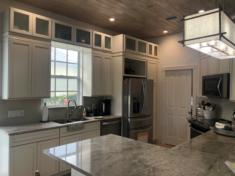 Example of a transitional kitchen design in Miami