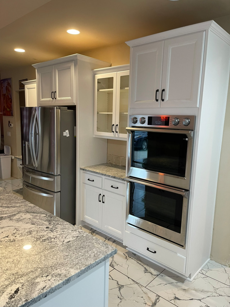 Bright White Kitchen Remodel With Custom Cabinet Finishing