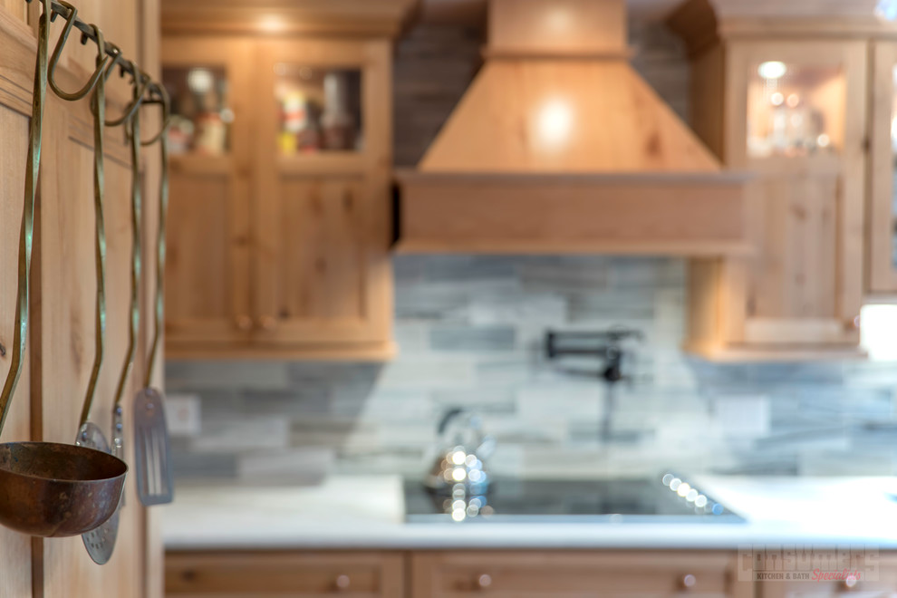 Inspiration for an eat-in kitchen remodel in New York with marble countertops and no island