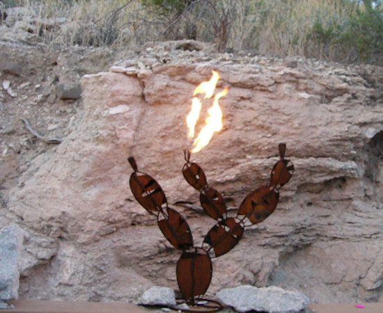 Inspiration for a backyard patio remodel in Phoenix with a fire pit