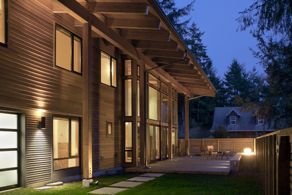 Design ideas for a contemporary exterior in Portland with wood siding.