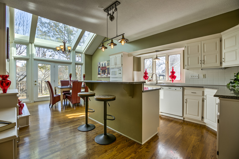 Example of a transitional kitchen design in Omaha