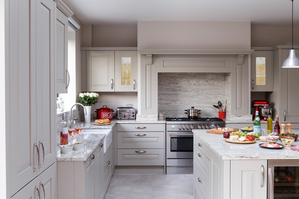 Design ideas for a traditional eat-in kitchen in Berkshire with a double-bowl sink, shaker cabinets, panelled appliances, with island, grey cabinets and quartzite benchtops.