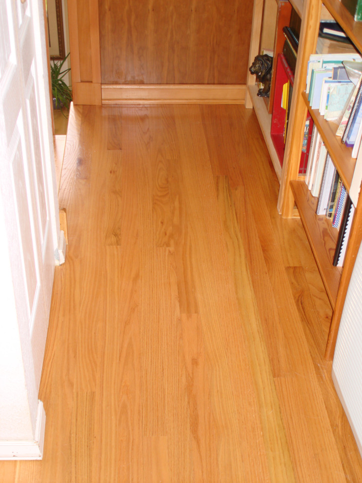 Custom Wood Stair Railing and Wood Flooring on Stairway and Hall