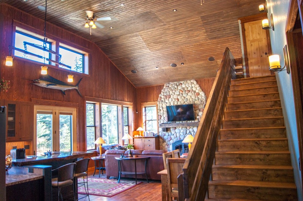 Inspiration for a mid-sized rustic wooden straight wood railing staircase remodel with wooden risers