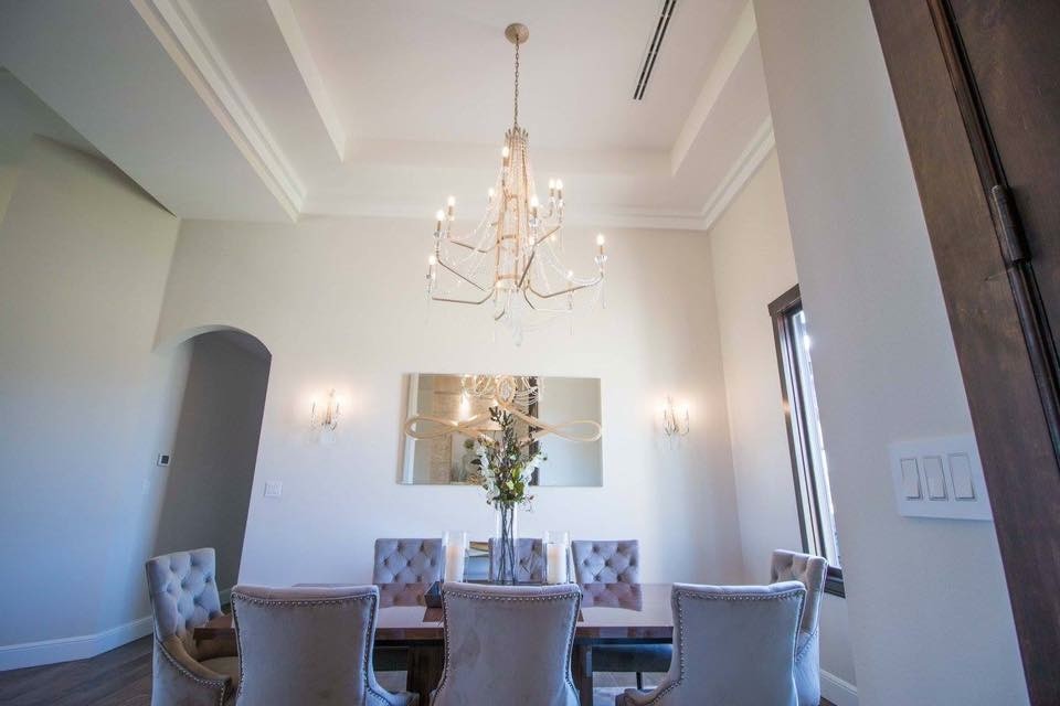 Example of a mid-sized transitional medium tone wood floor and brown floor enclosed dining room design with beige walls