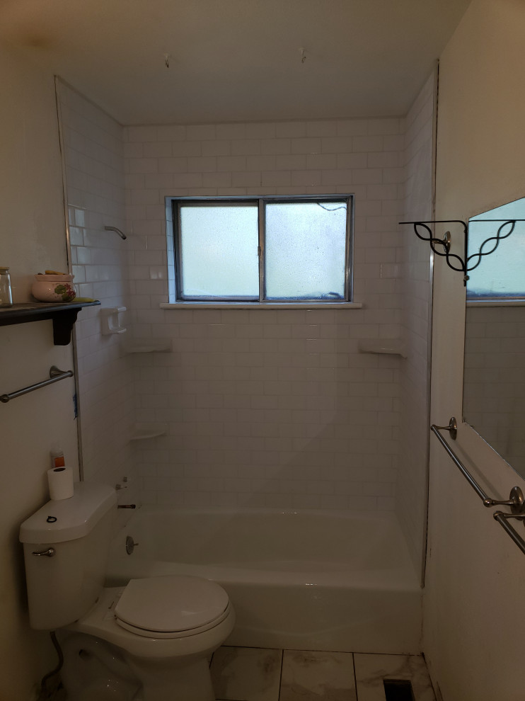 A Touch of Tradition with Subway Tile and a Calacatta Charm Floor