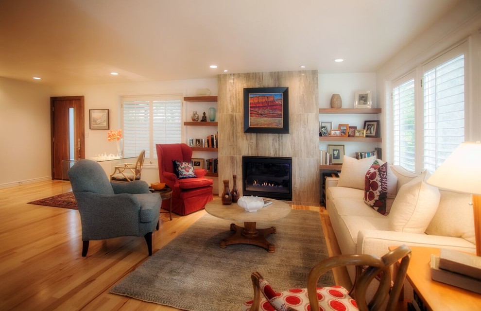 Design ideas for a large transitional open concept family room in Salt Lake City with white walls, light hardwood floors, a standard fireplace and a stone fireplace surround.