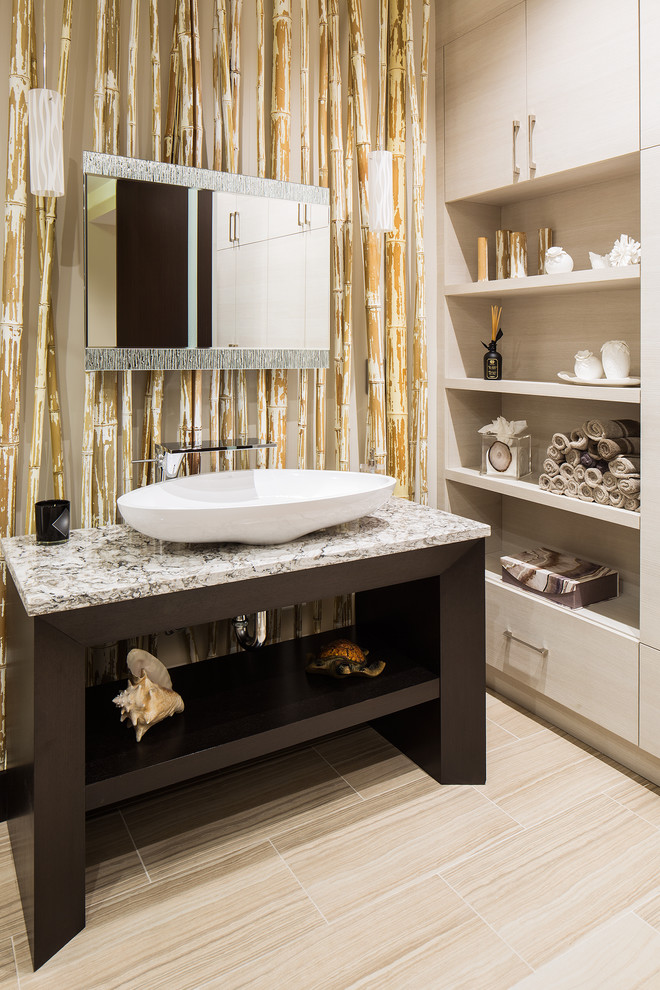 Asian bathroom in New York with open cabinets, dark wood cabinets and a vessel sink.