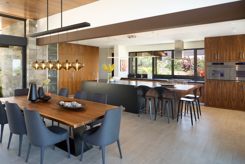 This is an example of a contemporary kitchen/dining combo in San Diego.