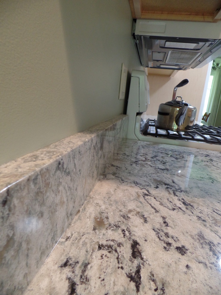 Example of a transitional home design design in Cedar Rapids