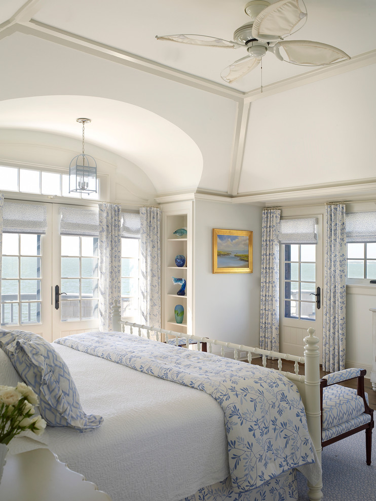 Bedroom - coastal bedroom idea in New York with white walls