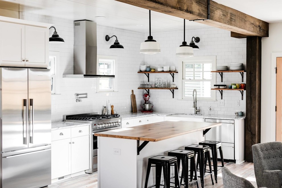 Inspiration for a transitional l-shaped kitchen in Richmond with wood benchtops, white splashback, with island, a farmhouse sink, open cabinets and subway tile splashback.