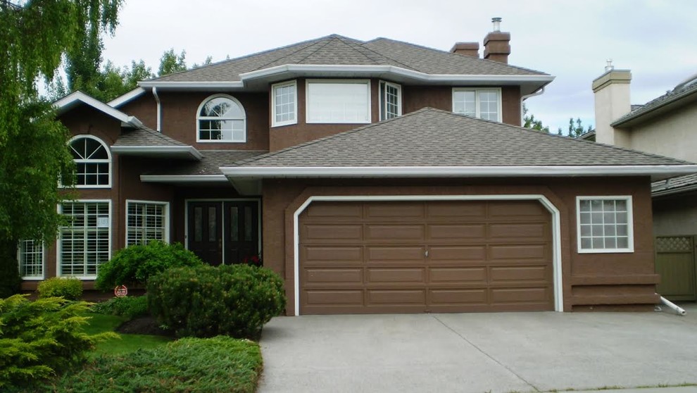 Transitional home design photo in Calgary