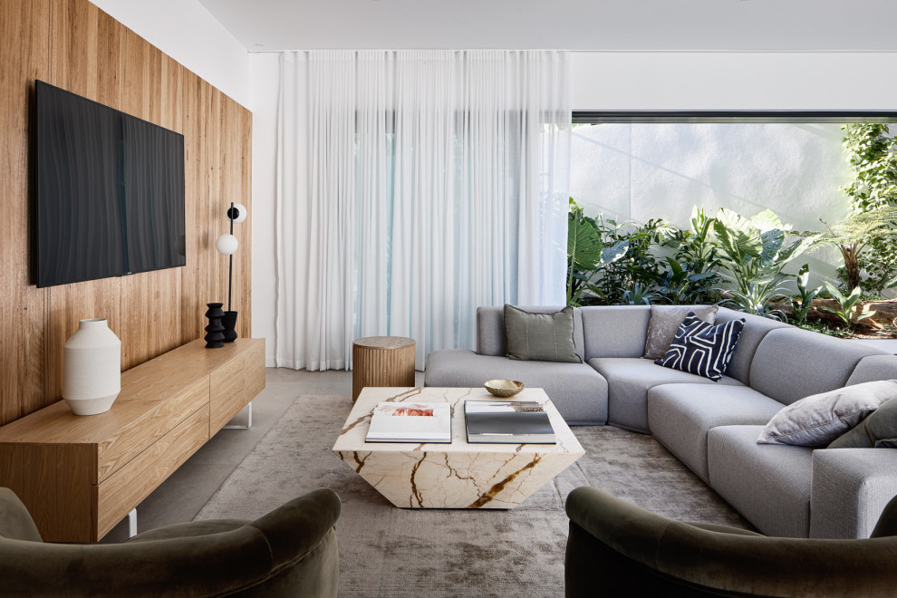 Photo of a mid-sized contemporary family room in Brisbane.