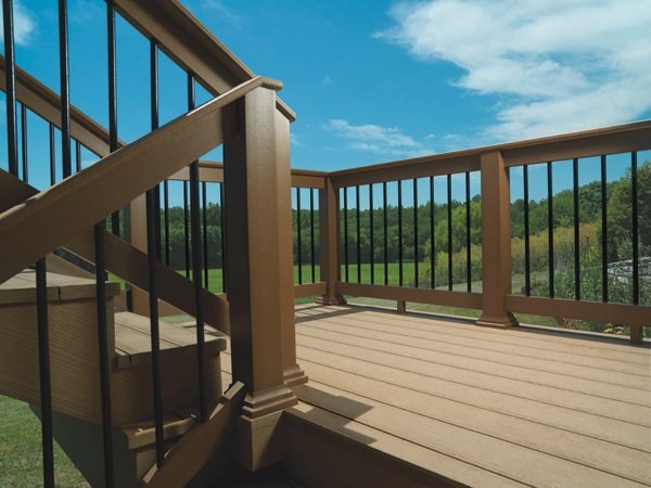Design ideas for a large contemporary backyard deck in Minneapolis.