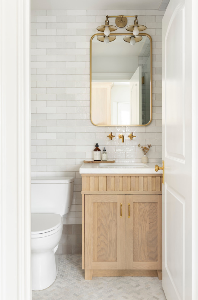 This is an example of a transitional powder room in Salt Lake City.