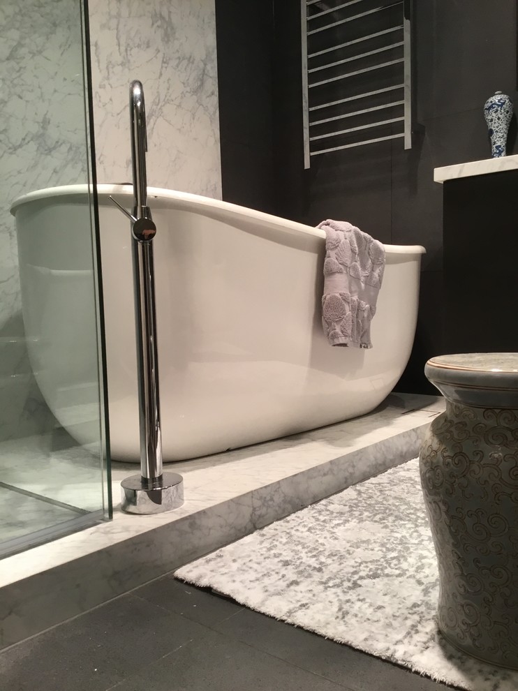Design ideas for a contemporary bathroom in Melbourne with a freestanding tub.