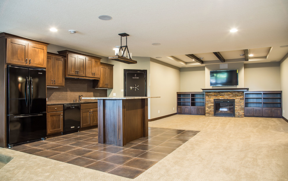 Transitional look-out carpeted basement photo in Minneapolis with gray walls, a standard fireplace and a stone fireplace