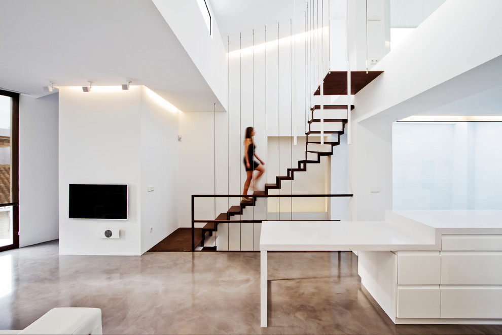 Large contemporary wood l-shaped staircase in Other with open risers.