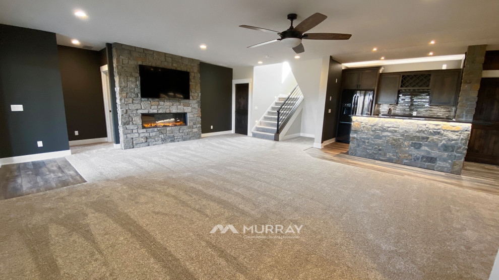 Example of a mountain style basement design in Omaha