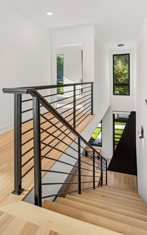 Example of a mid-sized danish staircase design in Minneapolis