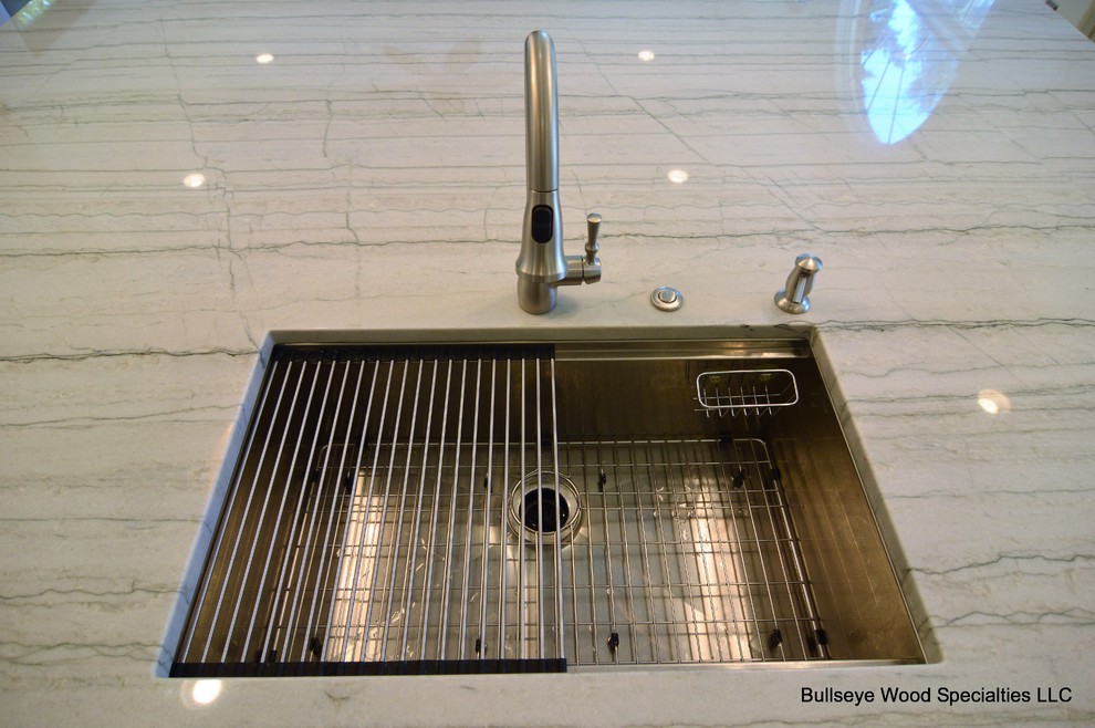 Inspiration for a large transitional u-shaped medium tone wood floor and brown floor eat-in kitchen remodel in DC Metro with a single-bowl sink, shaker cabinets, gray cabinets, quartzite countertops, white backsplash, ceramic backsplash, stainless steel appliances, an island and white countertops
