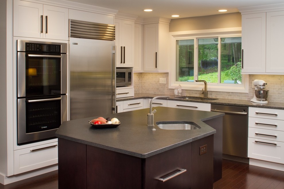 Photo of a mid-sized transitional kitchen in Boston with shaker cabinets, white cabinets and dark hardwood floors.