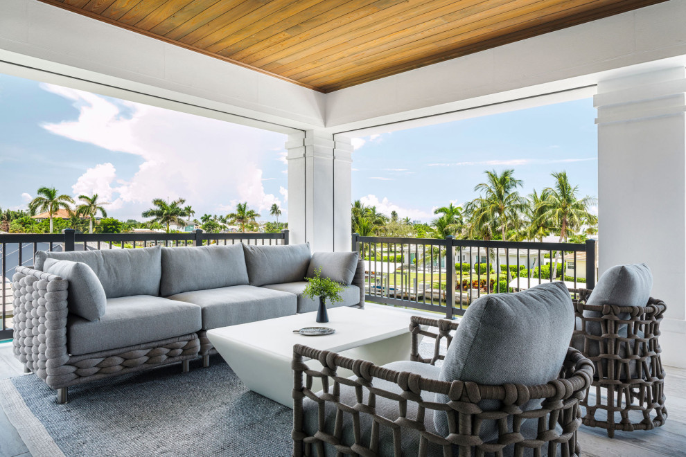 Example of a beach style balcony design in Other