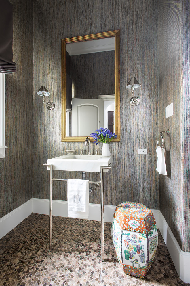 Photo of a transitional powder room in Houston.