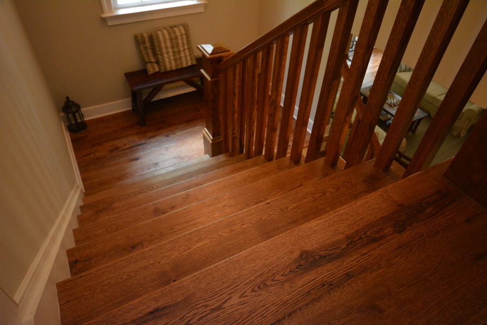 Mid-sized country wood straight staircase in DC Metro with painted wood risers.