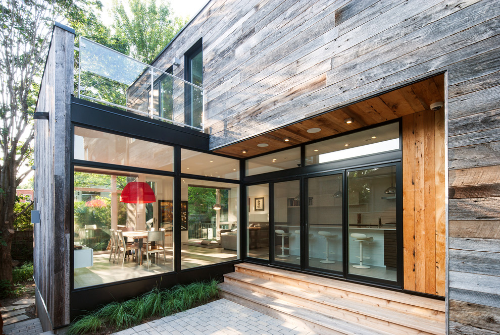 Mid-sized mountain style home design photo in Toronto