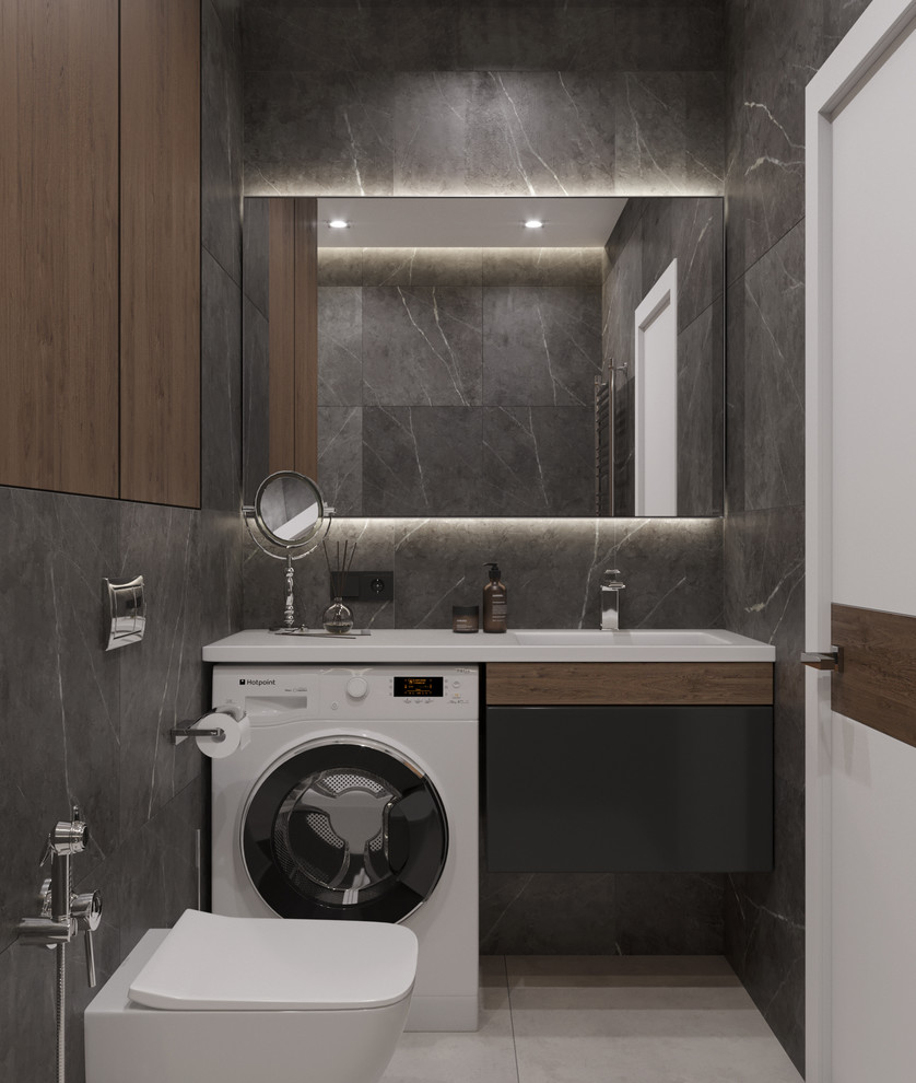 This is an example of a small contemporary master bathroom in Other with flat-panel cabinets, black cabinets, a wall-mount toilet, grey walls, an integrated sink, solid surface benchtops, grey floor, a shower curtain, white benchtops, an undermount tub, black tile, porcelain tile, porcelain floors, a single vanity and a floating vanity.