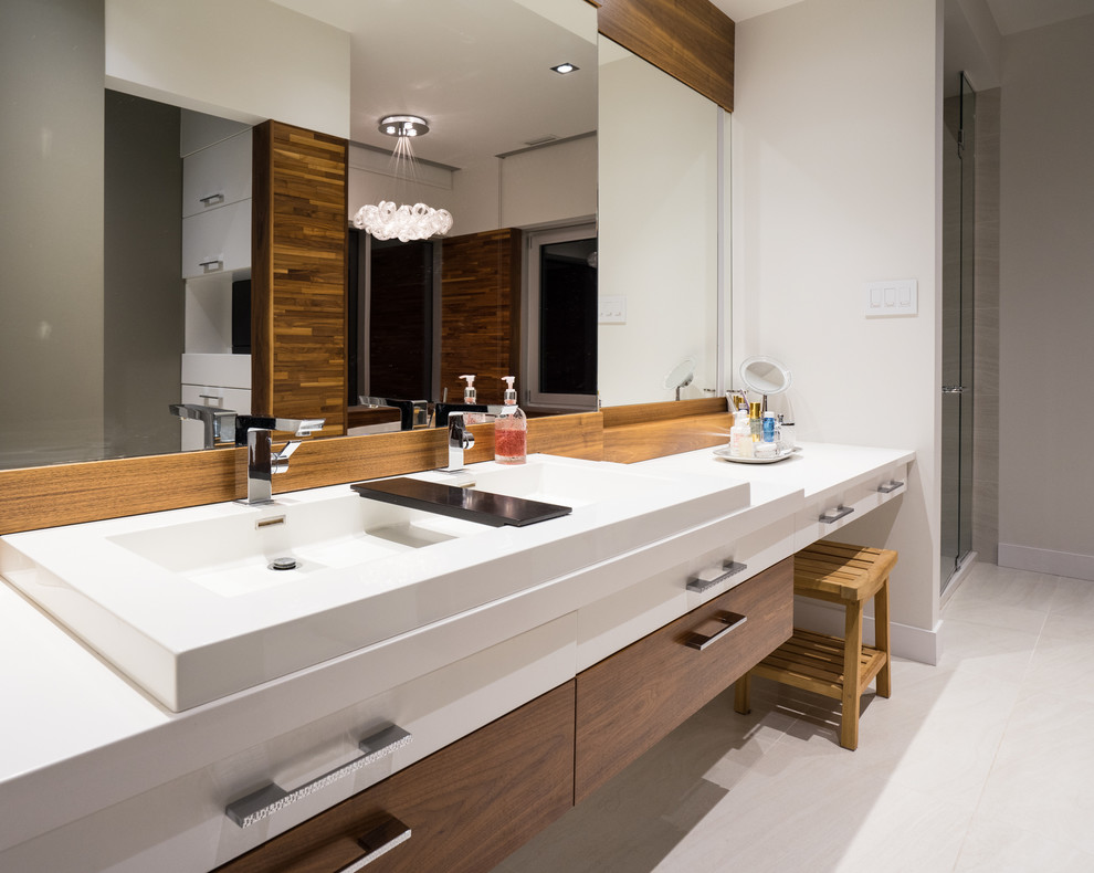 Photo of a modern master bathroom in Montreal with white tile and white walls.