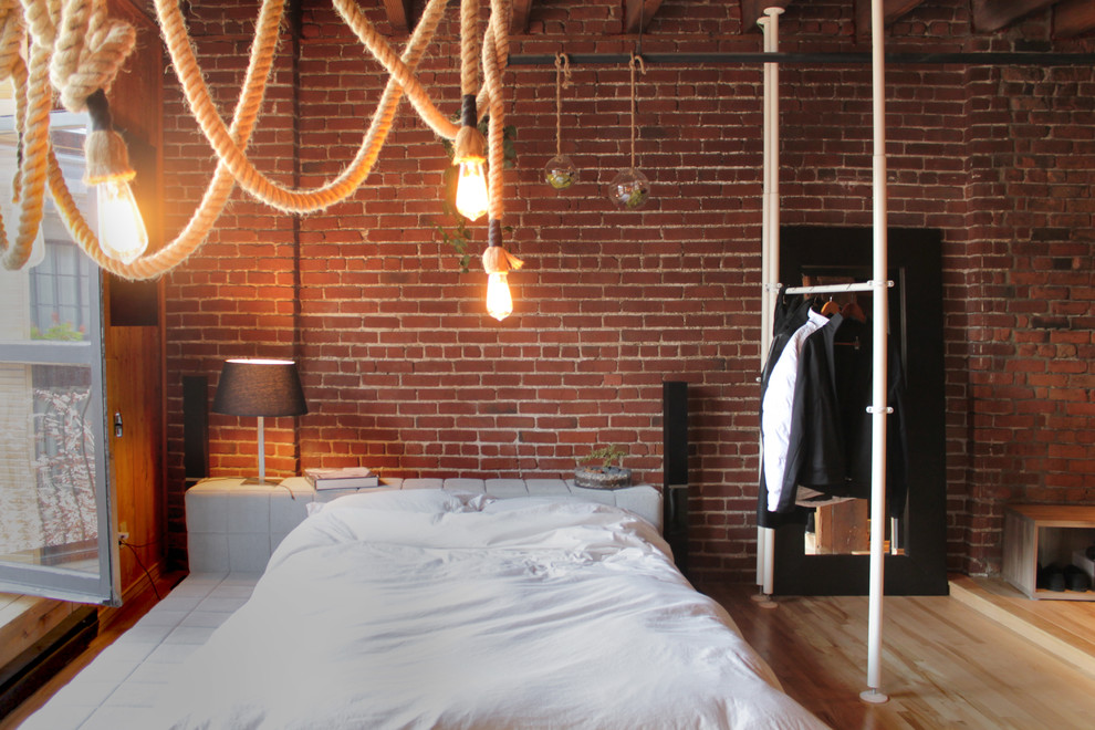 Inspiration for an industrial bedroom in Montreal.