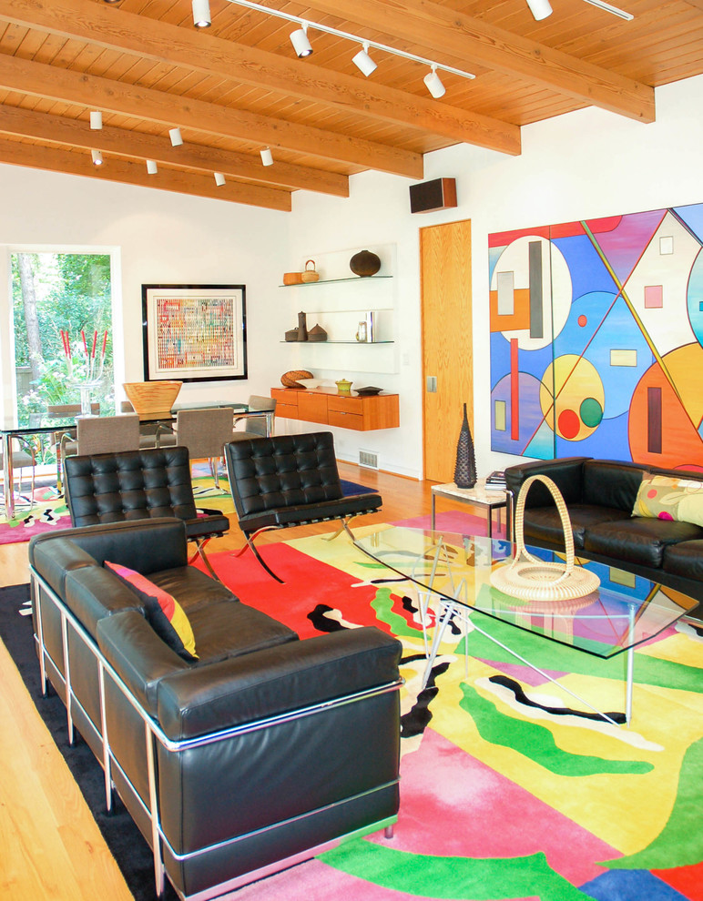 Inspiration for a large mid-century modern formal and open concept living room remodel in Chicago with white walls