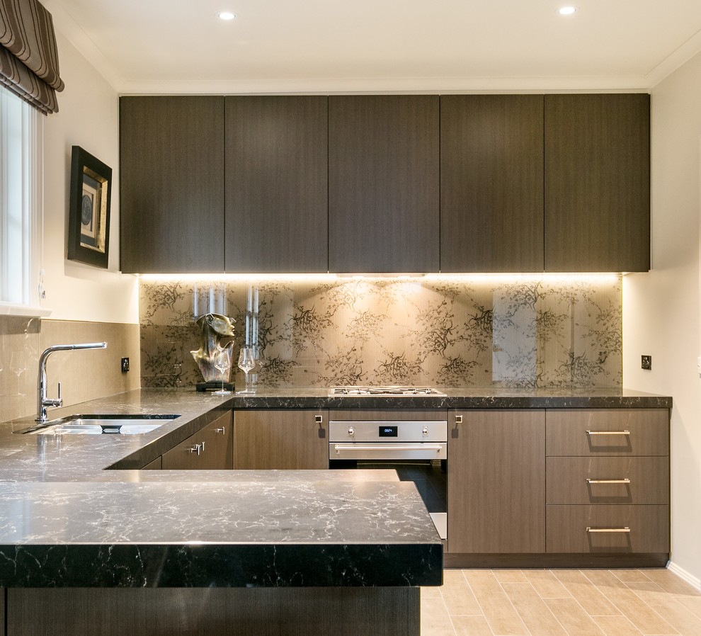 Photo of a small contemporary u-shaped eat-in kitchen in Melbourne with a double-bowl sink, flat-panel cabinets, medium wood cabinets, marble benchtops, multi-coloured splashback, glass sheet splashback, stainless steel appliances, light hardwood floors and no island.
