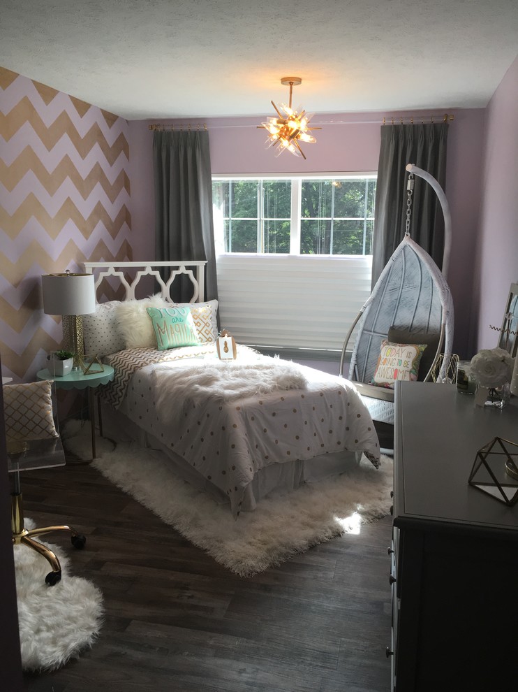 This is an example of an eclectic bedroom in Cleveland.
