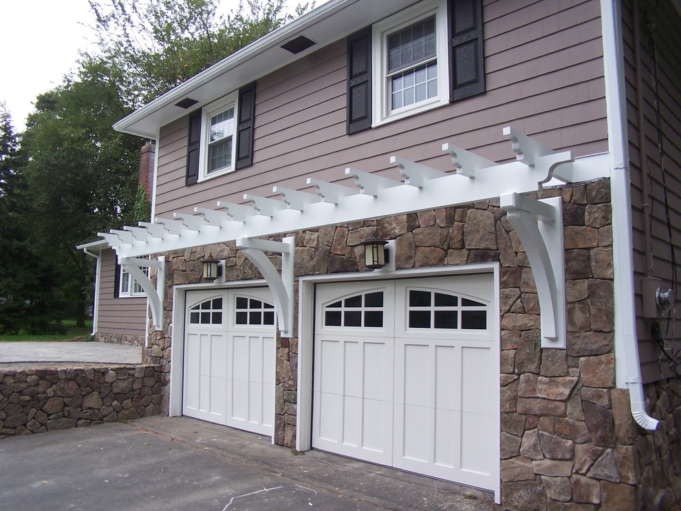 Mid-sized traditional attached two-car garage in Boston.