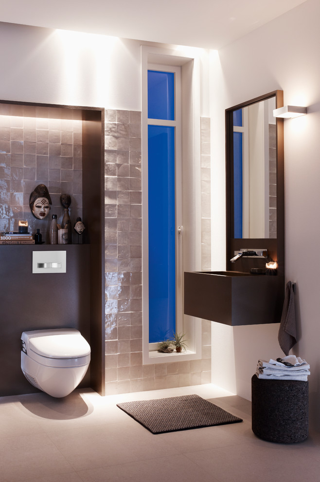 Photo of a small contemporary 3/4 bathroom in Chicago with a wall-mount sink, wood benchtops, a wall-mount toilet, beige tile, white walls and ceramic tile.